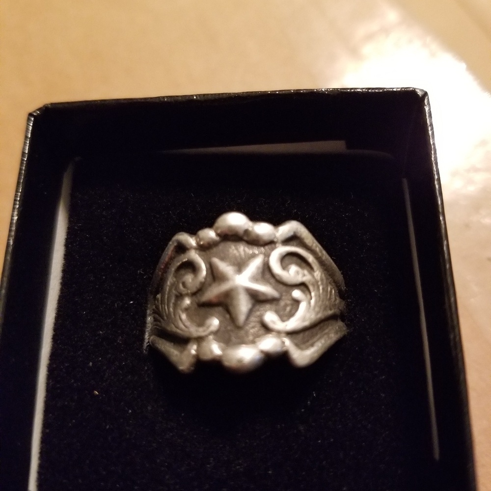 Sterling silver ring.. practically brand new.